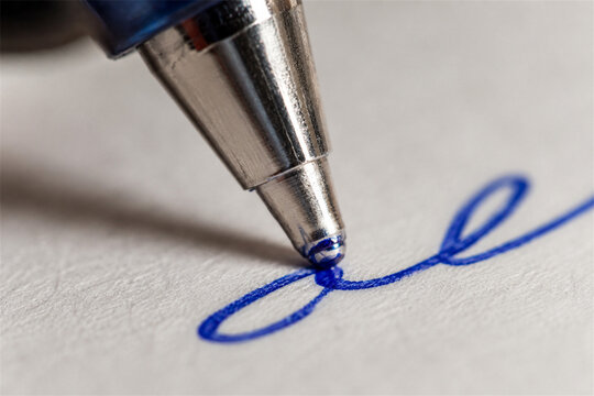 Close up view of a ballpoint pen creating a smooth blue loop on textured white paper showing handwriting practice office note taking focus and a clean everyday writing tool for documents
