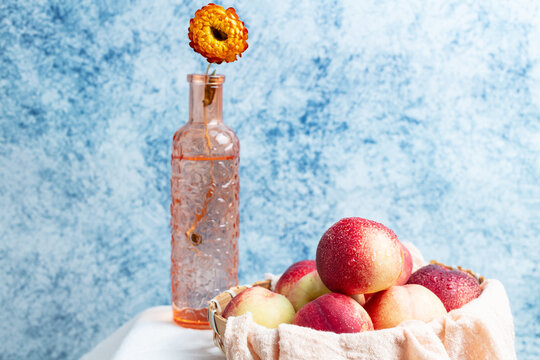 Fresh nectarine against a blue background