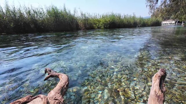 Water flow of the Azmak River in Akyaka, Mugla. Cold and clean Azmak river water. A natural tourist destination. 4k horizontal video. No people, nobody.
