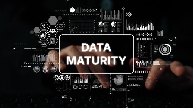 Focused Hands Typing on Keyboard with Overlay Text on Data Maturity Concept in Dark Environment. Asymptotic smart data analytic.