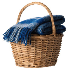 Obraz premium Woven wicker basket containing a folded blue herringbone pattern wool blanket isolated on transparent background