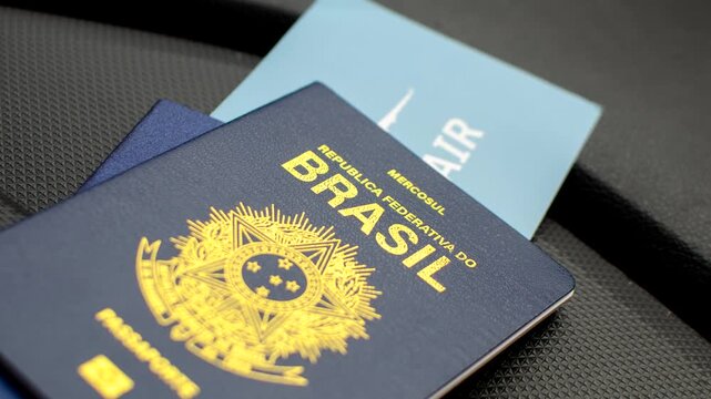 Brazilian passport highlighted on the dashboard, symbolizing travels and adventures. Exploring the world: Brazilian passport featured on the vehicle's dashboard.