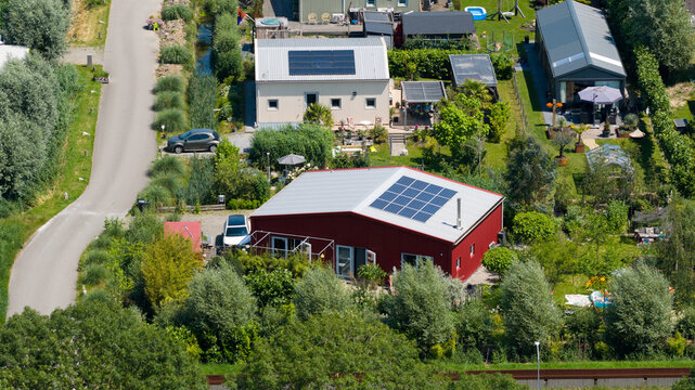 Aerial view of modern eco-friendly houses, Ecovillage in Almere