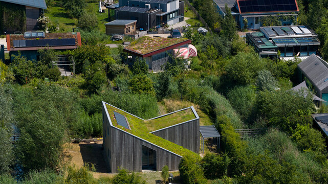 Aerial view of modern eco-friendly houses, Ecovillage in Almere