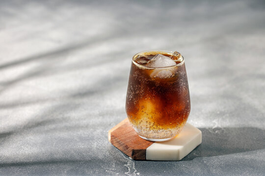 Espresso tonic. Trendy coffee drink in glass