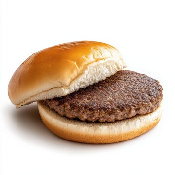 Classic beef hamburger on a plain bun isolated on white background