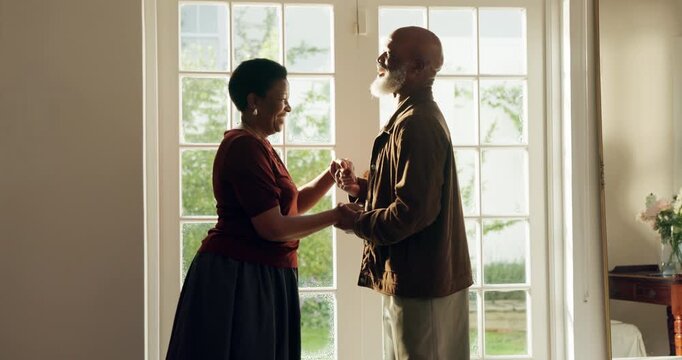 Love, tender or old couple in house with dance, romantic moment or bonding on weekend break. Laughing, groove or senior people with holding hands, rhythm or fun connection in healthy relationship.