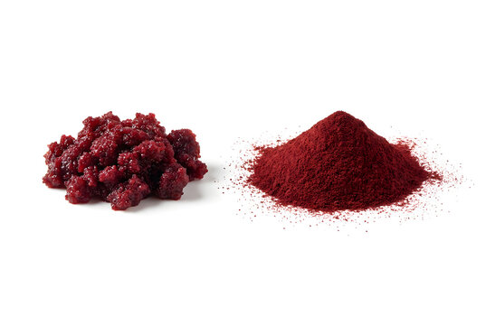 Beetroot pulp and concentrated beet extract powder on white