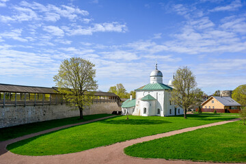 Fototapeta premium The courtyard of the Izborsk Fortress with St. Nicholas Cathedral, Pskov region of Russia
