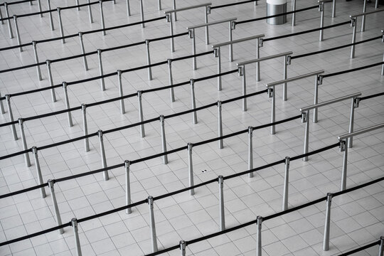 Airport terminal empty queue stanchions ropes barrier