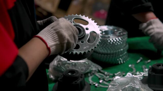 Expert Technician in Gloves Checks Engine Cylinder Mechanism on Production Line. Closeup Reveals Inner Mechanical Part Structure during Assembly. Industrial Chinese Quality Control Standard Process 4k