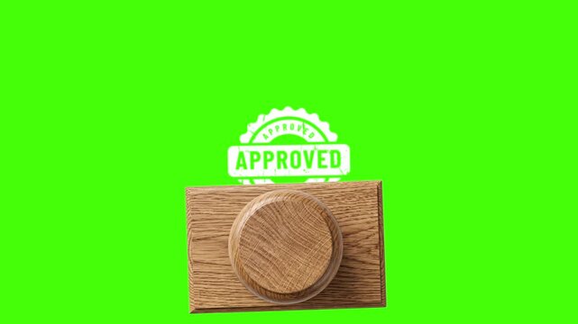 Approved stamp on wooden block on green screen background approved stamp, wooden block, approval seal, stamp imprint, green screen, chroma key, verification mark, quality control, certified, overlay