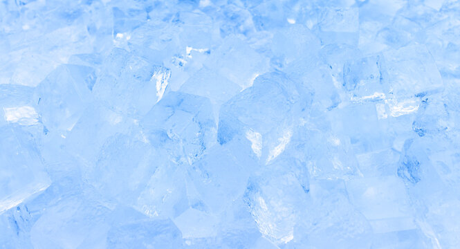 Versatile blue and white ice cubes texture background with cool refreshing feel and clear transparent details for elegant print media or digital web design projects.