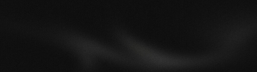 Fototapeta premium Black brushed metal texture background with subtle light streaks and grainy details, abstract industrial surface for sophisticated design projects.