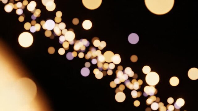 Cinematic Bokeh Light Particles Drifting in Dark Space