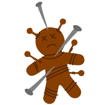 brown voodoo doll stuck with metal pins for magic