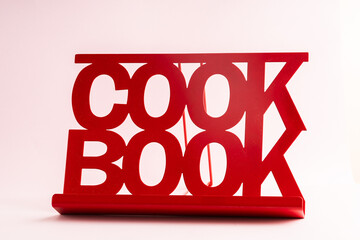 red cookbook stand © Lucy Rock