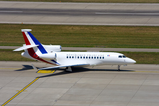 Dassault Falcon 7X airplane of French Air and Space Force taxiing to runway 28 at Swiss Z&uuml;rich Airport on a hot summer day. Photo taken June 22nd, 2026, Zurich Kloten, Switzerland.