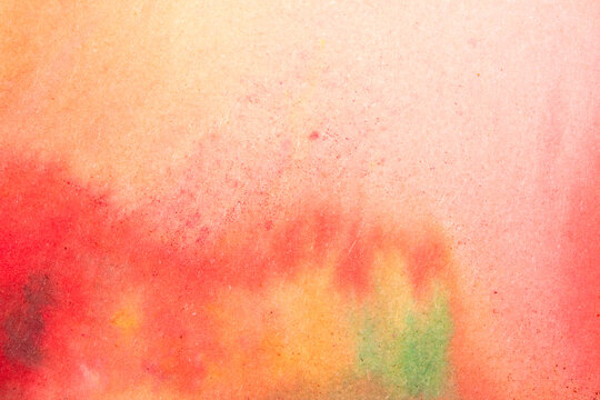 Vibrant multicolour watercolour paint background with blended colours