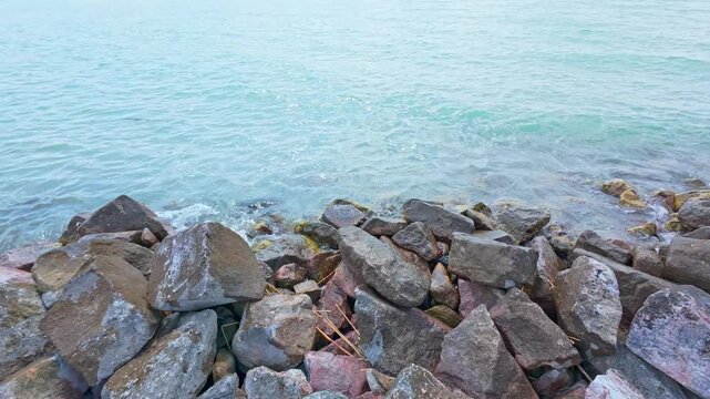 Siofok, Hungary - May 31, 2026 Rocky Shoreline and Lake Water