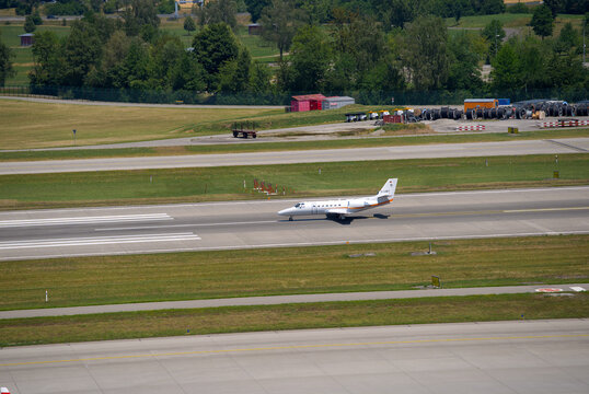 Private jet Cessna Citation Encore plus type registration D-CAWT taking off from Swiss Z&uuml;rich Airport on a hot summer day. Photo taken June 22nd, 2026, Zurich Kloten, Switzerland.