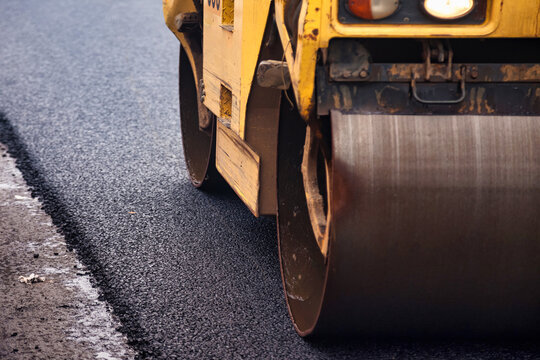 Paving Process for Urban Road With Asphalt Concrete During Daytime Work in City