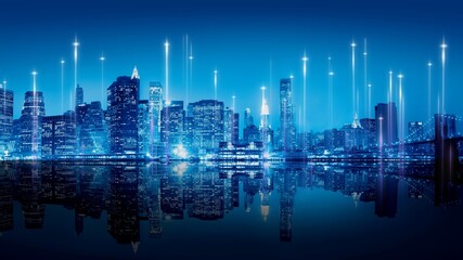 Futuristic city skyline at night with glowing digital data streams. © Rawpixel.com