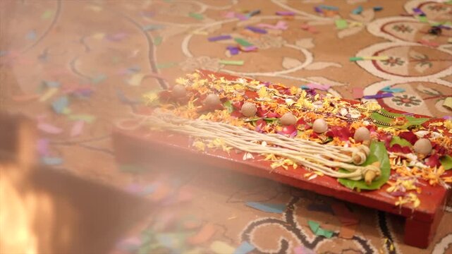 Slow-motion close-up of a sacred havan fire and wedding couple performing traditional Hindu marriage rituals, capturing devotion, blessings, and the spiritual essence of the ceremony.