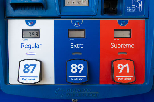 Close-up of a Gilbarco Veeder-Root fuel pump panel with Regular, Extra and Supreme grades, the regular price reading 79.9 cents per litre during the pandemic.
