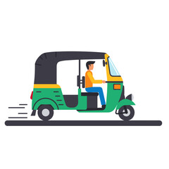Fototapeta premium Traditional auto rickshaw driving on road