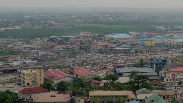 Aerial view of the urban landscape and highway infrastructure in Magboro-Akeran, Obafemi-owode, Ogun State, Nigeria.