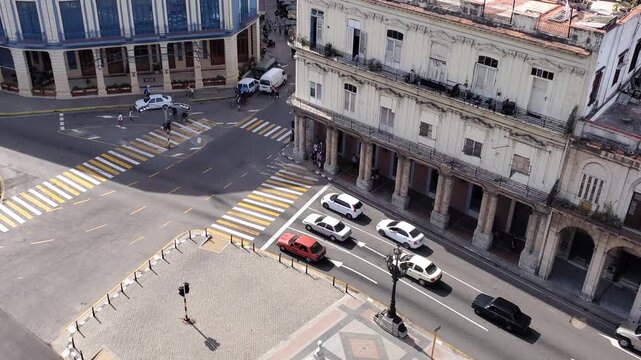 Aerial view of the historic Paseo del Prado with colonial architecture, busy street traffic, and crosswalks in Havana, Havana, Cuba.