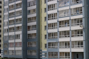 Fototapeta premium a residential building in the entire frame, a multi-storey building in close-up,