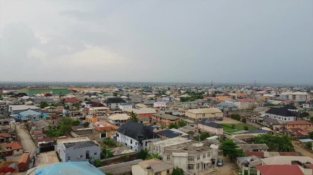 Aerial view of the urban landscape and highway infrastructure in Magboro-Akeran, Obafemi-owode, Ogun State, Nigeria.