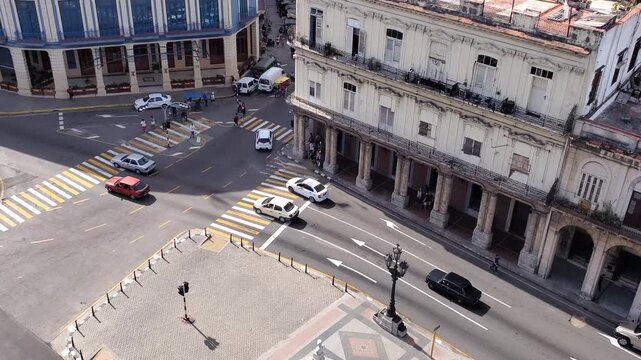 Aerial view of the Paseo del Prado intersection featuring historic colonial buildings and classic cars in Havana, Havana, Cuba.