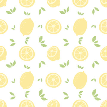 Hand-drawn lemons and green on a white background leaves seamless pattern. For fabric, paper wrap.