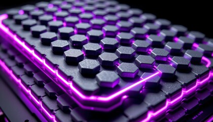 Fototapeta premium The image features a close up of a modern electronic device with a sleek black surface covered in raised hexagonal tiles