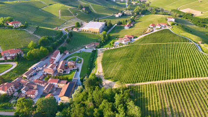 Fototapeta premium Aerial View of Barolo Village and Lush Vineyards in Piedmont Italy