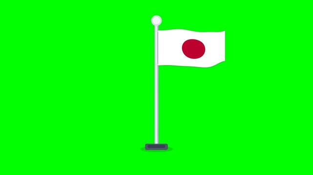 Japan national flag waving on a pole over green background
