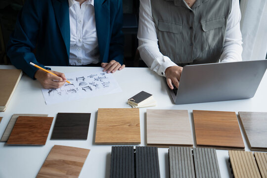 Interior Designer Consulting with Client on Material Selection