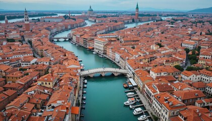Obraz premium Aerial view of historic canal city at sunrise