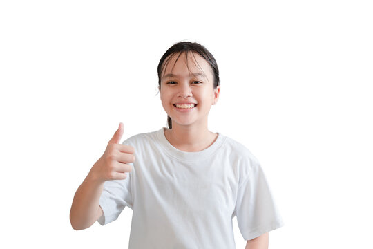 Cheerful girl showing a thumbs up gesture on a white background, symbolizing success, encouragement, satisfaction, recommendation, and optimistic attitudes