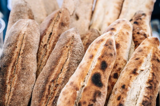 Freshly baked traditional long bread loaves