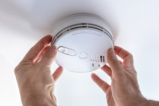 Home smoke and fire alarm detector installing, checking, testing or replace battery