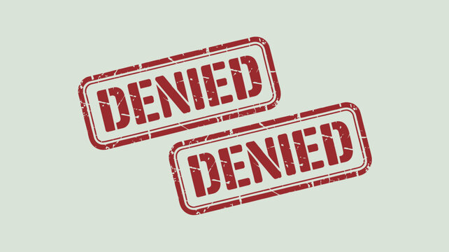 Two red rubber stamped denial messages with distressed texture on a white background denied rejection refusal veto disapproval negative