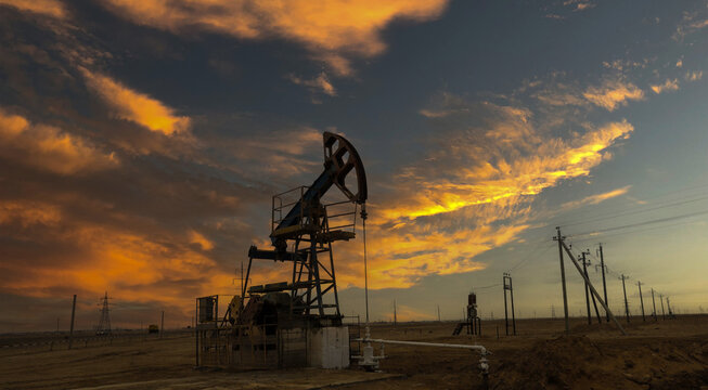 An oil pump pumps crude oil in the steppes of Kazakhstan near the city of Aktau.