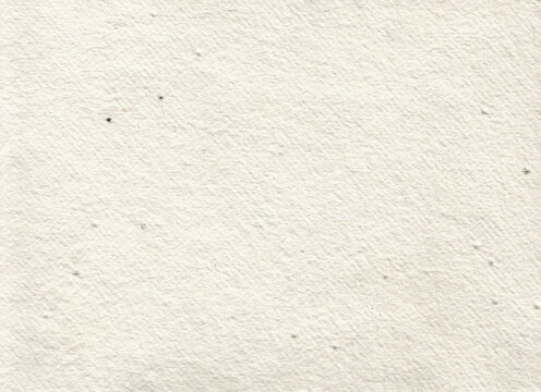 Bright clean ivory off-white handmade cotton rag paper texture with fine surface grain and tiny rustic imperfections. Beautiful luxury background template for wedding invitations