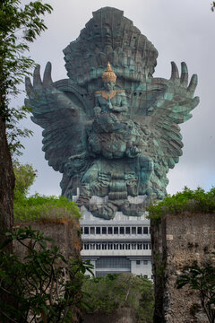 Garuda Wisnu Kencana giant statue at GWK Cultural Park in Bali, Indonesia, showing Lord Vishnu riding Garuda with copper finish.
