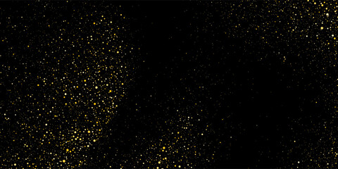 Fototapeta premium Gold glitter texture on a black background. Holiday background. Golden explosion of confetti. Golden grainy abstract texture on a black background. Design element