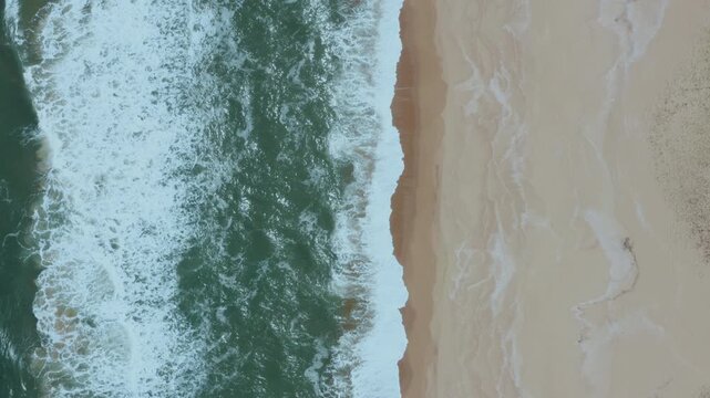 Aerial Drone View of Playa Garzon Beach on the Atlantic Ocean with small waves